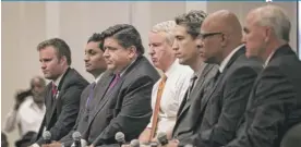  ?? | ASHLEE REZIN/ SUN- TIMES ?? Democratic governor candidates Alex Paterakis ( from left), Ameya Pawar, J. B. Pritzker, Chris Kennedy, Daniel Biss, Tio Hardiman and Bob Daiber on Sunday.