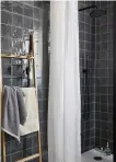  ??  ?? Woven cotton shower curtain with detachable liner, £20, Dunelm