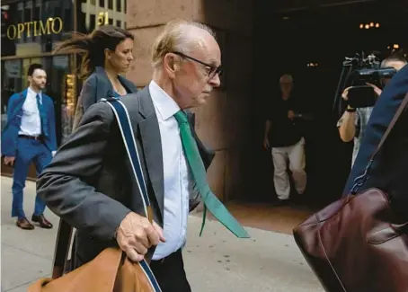  ?? BRIAN CASSELLA/CHICAGO TRIBUNE ?? Tim Mapes, former chief of staff to House Speaker Michael Madigan, departs after being found guilty on federal perjury charges Thursday outside the Dirksen U.S. Courthouse.