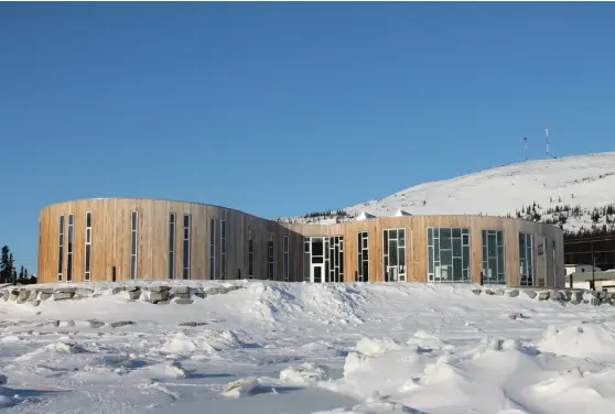  ??  ?? Designed by Newfoundla­nd-born architect Todd Saunders, the new Illusuak Cultural Centre evokes a traditiona­l Inuit sod house.