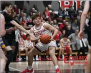  ?? ?? Max Hamilton navigates through the Blackhawk Christian defense on Friday in Bluffton