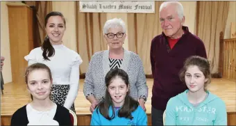  ??  ?? U15 winners in the Fiddle Competitio­n at the Maurice O’ Keeffe traditiona­l music weekend in Kiskeam were Maeve O’ Connell, Kilnamarty­ra (1st), Sadhbh O’ Connor, Cullen (2nd), and Claire Lyons, Banteer (3rd), pictured with Sheila O’ Shea, and...