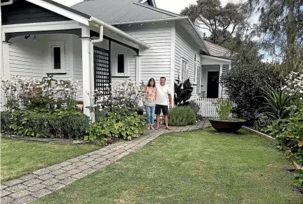  ??  ?? Wayne and Sue Dymond say while it has taken them a while to find the right tradespeop­le, they’ve received a warm welcome from their new neighbours in Gisborne.