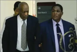  ?? POOL, GETTY IMAGES ?? Bill Cosby arrives with aide Andrew Wyatt at Cosby’s sexual assault trial at the Montgomery County Courthouse in Norristown, Pennsylvan­ia, on Thursday.