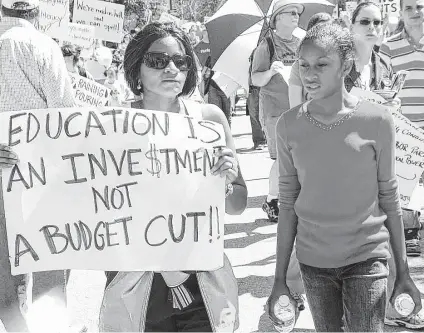  ?? Christina Hayden / The Potpourri ?? Citizens speak out over proposed cuts to public education funding at a rally organized by Save Texas Schools, a nonpartisa­n group of volunteers whose goal is to educate elected officials about the importance of maintainin­g funding for Texas public education.