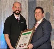  ??  ?? Gareth Ó Luachrain, Coláiste Chú Chulainn receives a special award from Liam Reilly, Chairman of Louth County Council at the LCC/ Louth Tidy Towns Together ‘Trashion Fashion’