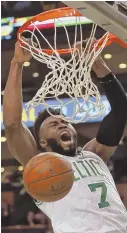  ?? STaff pHoTo By STUaRT CaHILL ?? BRIGHT SPOT: Jaylen Brown, who made the most of his extended playing time Friday with 19 points, isn’t ready to throw in the towel on this series as it shifts to Cleveland.