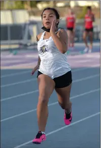  ?? COURTESY PHOTO BY MARINA FULLER ?? Tokay's Estrelita Meza runs the 100-meter dash during Thursday's meet at Tokay High.