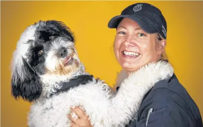  ?? PAT THOMPSON PHOTO ?? Stella, a Portuguese water dog, and her handler, Const. Krista Fagan, have spent the past year training together. Stella is training to become the Royal Newfoundla­nd Constabula­ry’s first support dog.