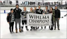  ?? SUBMITTED PHOTO — TOM LOMBARDI ?? Senior members of the Hill School girls ice hockey team, center, gather with their coaches after winning the WIHLMA Championsh­ip on Sunday.