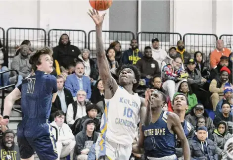  ?? Pete Paguaga/Hearst Connecticu­t Media ?? Kolbe Cathedral’s Najimi George during a boys basketball game between Notre Dame-Fairfield and Kolbe Cathedral at the Cardinal Shehan Center in Bridgeport on Tuesday.