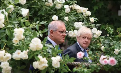  ?? Photograph: Dominic Lipinski/PA ?? ‘What makes this election feel closer to home is that the Australian right’s thinking remains core to Boris Johnson’s project.’ Johnson (right) with then Australian prime minister Scott Morrison at 10 Downing Street, London, in December 2021.