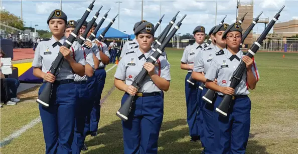  ??  ?? High school drill teams are fiercely competitiv­e in Florida.