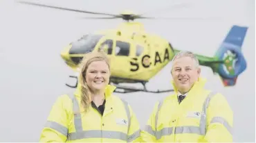  ??  ?? Anna Light, head of engagement at Edinburgh Airport, gets together with David Craig, chief executive of Scotland’s Charity Air Ambulance as the airport announced the vital emergency healthcare service as its corporate charity of 2018.