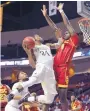  ?? DAVID BECKER/AP ?? Wyoming guard Louis Adams (24) shoots against USC forward Chimezie Metu on Friday.