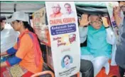  ?? HT PHOTO ?? Haryana chief minister Manohar Lal Khattar riding an erickshaw driven by a woman in Karnal.