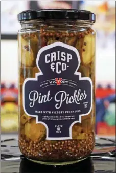  ?? PHOTO BY EMILY RYAN ?? Crisp & Co. collaborat­ed with Victory Brewing Company on Pint Pickles.