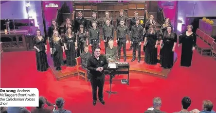  ??  ?? On song Andrew McTaggart (front• with the Caledonian Voices choir