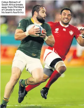  ??  ?? Cobus Reinach of South Africa breaks away from Phil Mack of Canada to score his team’s fourth try