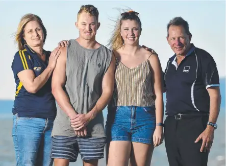  ?? Picture: MATT TAYLOR ?? A FIGHTER: Ryan Francis with his parents Minnie and Kenny Francis and fiancee Emily Holroyd.