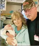  ?? Photograph­s submitted ?? Paternal grandparen­ts LaRay and Jr. Thetford with baby Jet in December at Arkansas Children’s Hospital. LaRay is the nurse at Pea Ridge High School, where she has worked for 17 years.