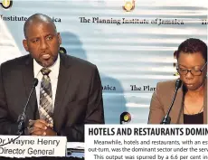  ??  ?? Director General of the Planning Institute of Jamaica, Dr Wayne Henry (left) addresses journalist­s at Tuesday’s quarterly media briefing at the agency’s New Kingston head office. Also pictured is Statistica­l Institute of Jamaica Director General, Carol...