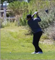  ?? Georgia Rios/The Signal ?? West Ranch boys golf’s Gunnar Murray takes a swing at the first tee in Foothill League meet No. 4 at Sand Canyon Country Club on Tuesday.