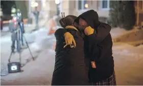  ?? LIAM RICHARDS /THE CANADIAN PRESS ?? Members of Colten Boushie’s family console each other Friday after a jury delivered a verdict of not guilty in the trial of Gerald Stanley.