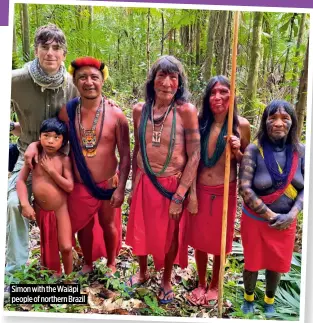  ?? ?? Simon with the Waiãpi people of northern Brazil