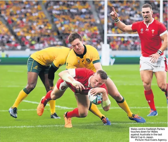  ??  ?? Wales centre Hadleigh Parkes touches down for Wales against Australia in the last World Cup in Japan.
Picture: Huw Evans Agency.