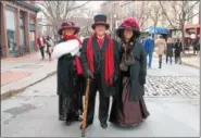  ?? LAUREN HALLIGAN — LHALLIGAN@TROYRECORD.COM ?? Many visitors donned Victorian garb at the 35th annual Troy Victorian Stroll on Sunday in downtown Troy.