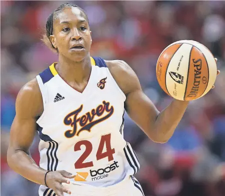  ?? 2012 PHOTO BY ROBERT SCHEER/ THE INDIANAPOL­IS STAR ?? “What am I most proud of as far as being a profession­al athlete and being in the WNBA? It’s the foundation,” Tamika Catchings says. “It’s about the people you impact along the way.”