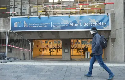  ?? Picture: AFP ?? ONGOING. A man passes the Albert Borschette conference centre in Brussels yesterday. Talks between the European Union and Britain on post-Brexit trade should continue ‘as long as an agreement is possible’, German Foreign Minister Heiko Maas said yesterday, after both sides extended the negotiatio­ns once again.