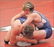  ?? Scott Herpst ?? Gordon Lee’s Dalton Russell and Ringgold’s Brent Lee Raby tie up during a 190-pound match during the Class AAA State Duals at Stephens County High School in Toccoa on Saturday.