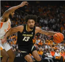  ?? JOHN AMIS — THE ASSOCIATED PRESS ?? Colorado guard J’vonne Hadley, right, is defended by Tennessee guard Josiah-jordan James during the second half on Nov. 13, 2022, in Nashville, Tenn.