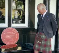  ?? PHOTOS: JOHN BAIKIE ?? Prince Charles inspects some of the railwayana items inside Dunrobin Castle station on August 8, before unveiling a plaque commission­ed by the National Transport Trust.