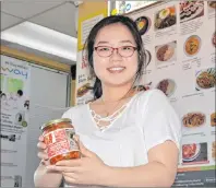  ?? TERRENCE MCEACHERN/THE GUARDIAN ?? Lisa Han of Seoul Food in Charlottet­own was instrument­al in getting her father’s kimchi on the shelves of Sobeys stores in Atlantic Canada.