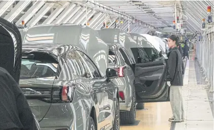  ?? NYT ?? A Zeekr electric vehicle factory in Ningbo. The new auto brand is part of Geely Group.