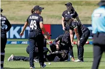  ?? GETTY IMAGES ?? Lauren Down injured her thumb taking a catch against India on Thursday and is out of the World Cup.