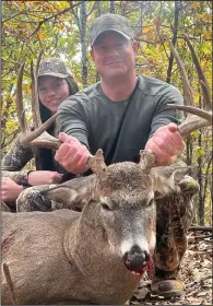  ?? (Photo submitted by Ashley Carter) ?? John Carter of Little Rock put the finishing touch on a phenomenal Oklahoma deer hunt by taking this 12-point buck in Cherokee County.