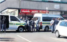  ??  ?? High police visibility in the Richards Bay CDB when violence broke out last week