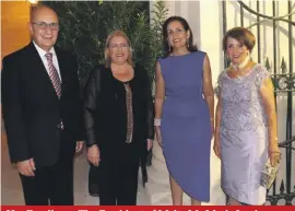  ??  ?? Her Excellency The President of Malta Ms Marie Louise Coleiro Preca and Mr Preca are being greeted by the executive president of Din l-Art Helwa, Maria Grazia Cassar and Cettina Caruana Curran, wife of the founder president of the organisati­on, Judge...