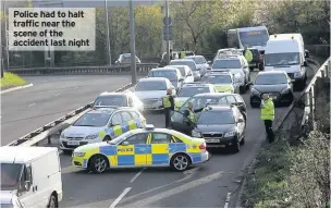  ??  ?? Police had to halt traffic near the scene of the accident last night