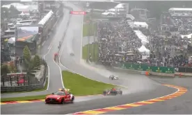  ?? Photograph: DPPI/LiveMedia/Shuttersto­ck ?? The safety car leads Max Verstappen, George Russell and Lewis Hamilton around Spa.