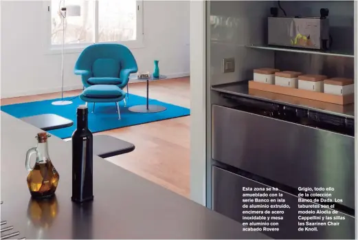  ??  ?? Esta zona se ha amueblado con la serie Banco en isla de aluminio extruido, encimera de acero inoxidable y mesa en aluminio con acabado Rovere Grigio, todo ello de la colección Banco de Dada. Los taburetes son el modelo Alodia de Cappellini y las sillas las Saarinen Chair de Knoll.