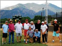  ?? Courtesy of Mark Pritchard ?? Founding members of the Taos Senior Baseball League, standing from left to right: Mark Pritchard, Carl Dawson, Alex Wyche, Norm Cutliff, Jeff Northrup, Marc Gross, Chip Weber, Charlie Bonfanti and Eric Larson, in perpetual motion. Kneeling: Steve Wiard and Steve Rose. Gary Atias was late for the photo.