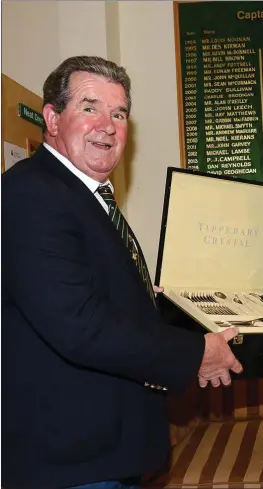  ??  ?? Seapoint GC President Paddy Sullivan congratula­tes Aidan Conlon on winning