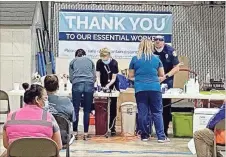  ?? Contribute­d ?? Shaw Industries, Mohawk Industries and Engineered Floors collaborat­ed on a COVID vaccinatio­n event for the workers at their Dalton-area plants recently. Almost 5,000 shots were administer­ed over two weeks.