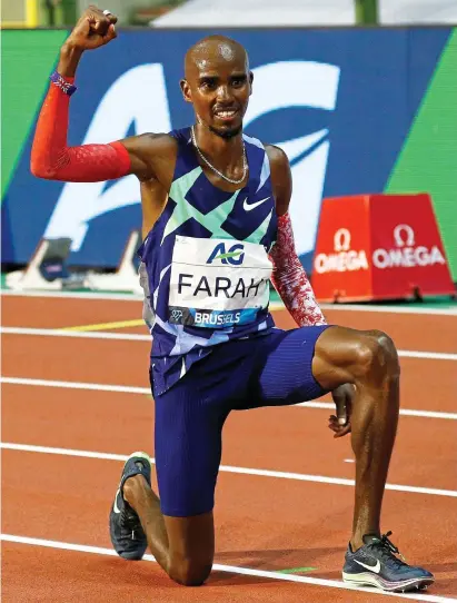  ?? REUTERS ?? He’s done it! Farah celebrates after breaking the one-hour record in Brussels last night