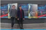  ??  ?? Writers Joe Robertson (right) and Joe Murphy pose outside the Young Vic Theatre in central London. — AFP